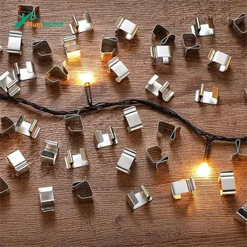 50 vnt metaliniai kalėdinių lempučių spaustukai 